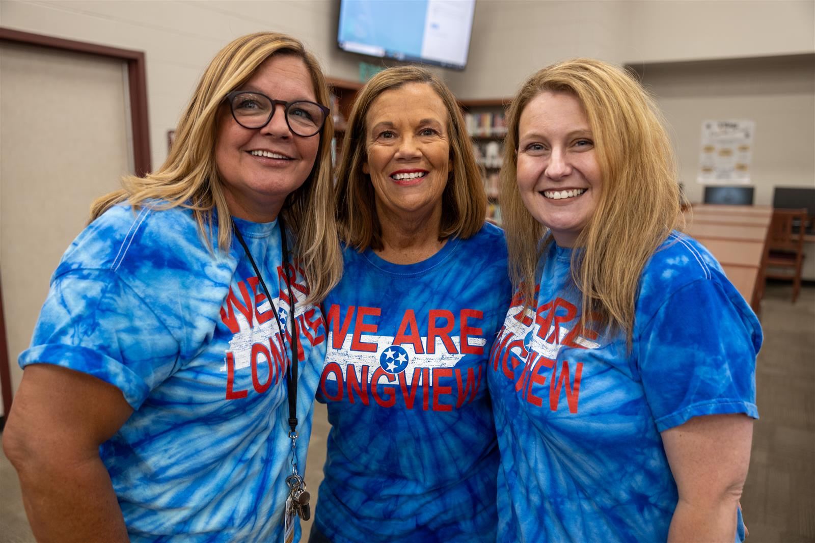 three ladies smiling